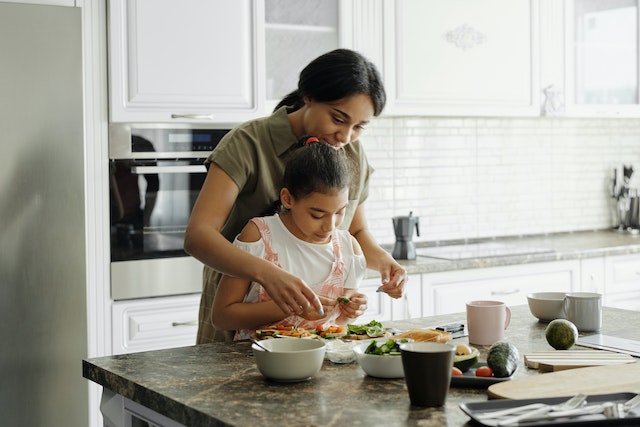 mom and daughter in kitchen